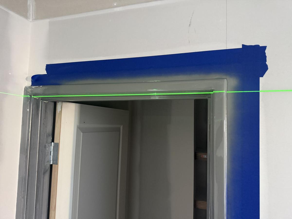 The same frame head set level with a laser, filled and primed